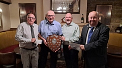 Pictured are Oldham Rotary President Bernard Stone together with Andy Czakow from Crompton and Royton Rotary and Keith Quarmby of Chadderton and Failsworth Rotary, and Frank Rothwell with the shield