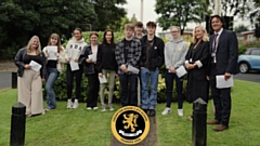 Mr Newell, Executive Head of the Crompton House Multi Academy Trust, pictured (right) with students this morning