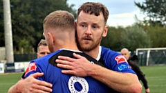 Man-of-the-match Deane Smalley hugs Kyle Hawley at the end of Saturday's game. Image courtesy of Rob Currell