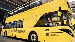 Greater Manchester mayor Andy Burnham inside a Bee Network bus. Image courtesy of TfGM