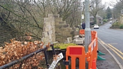 The wrecked bus stop on Dobcross New Road