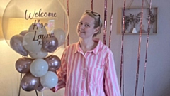 Laura celebrates returning home after her cancer treatment