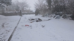 Rubbish can be seen close to the entrance at the Parish Cemetery at Gellfield Lane in Uppermill