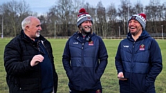 Bill Quinn is pictured (left) with Sean Long and George Riley, Oldham's head of media and communications. Image courtesy of ORLFC