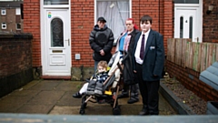 David Harvey, Leighanne, Elliot (2) and Cody (13) outside their home in Shaw. Images courtesy of Jason Hansford / MEN