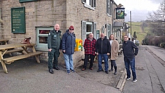 Pictured (left to right) are: Gareth Farnan-Jones, Robert Cragg and Rob Knotts (Scouthead and Austerlands Community Group), Mick Wilkin, Spinners Arms landlord, Councillor Alicia Marland and Councillor Garth Harkness